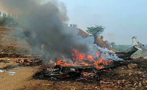 Maharashtra Deputy Chief Minister Ajit Pawar's plane in flames after it crashed during landing, at Baramati in Pune district, Maharashtra, Wednesday, Jan. 28, 2026. 
