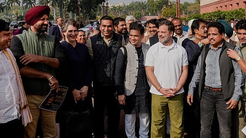 Congress MPs Rahul Gandhi, Priyanka Gandhi Vadra, Hibi Eden, Amarinder Singh Raja Warring and others protest at the Parliament complex against the suspension of eight MPs from the Lok Sabha and the India-US trade agreement during the Budget session of Parliament, in New Delhi, Tuesday, Feb. 3, 2026.