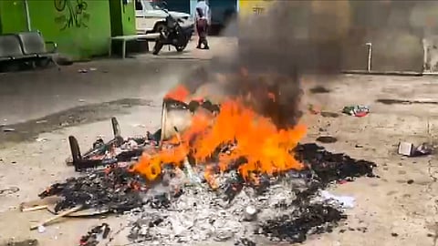 Flames billow at the TMC office following the West Bengal Assembly election result, in Asansol, Tuesday, May 5, 2026.