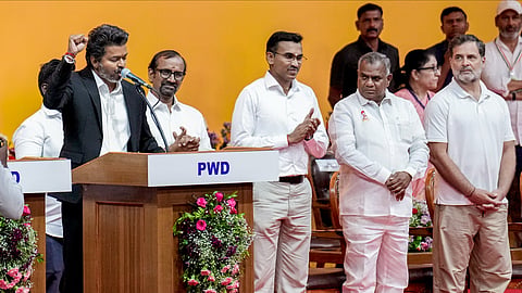 Tamilaga Vettri Kazhagam (TVK) chief C Joseph Vijay takes oath as the Tamil Nadu Chief Minister during the swearing-in ceremony, at Jawaharlal Nehru Stadium, in Chennai, Sunday, May 9, 2026. Congress MP and Lok Sabha LoP Rahul Gandhi is also present.