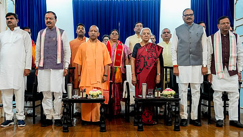 Uttar Pradesh Governor Anandiben Patel, state Chief Minister Yogi Adityanath, state Deputy Chief Minister Keshav Prasad Maurya and Brajesh Pathak during the expansion event of the state government, in Lucknow.