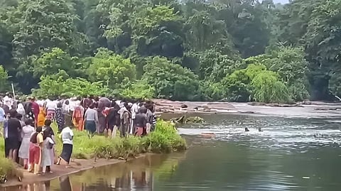 Rescue operations underway at the river where the students drowned.