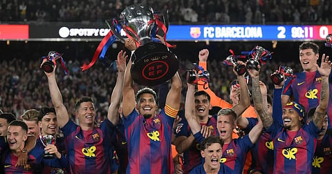Barcelona retains Spanish league title by beating rival Real Madrid