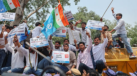 National Students' Union of India (NSUI) members stage a demonstration against the National Testing Agency (NTA) over alleged paper leak concerns following the cancellation of the NEET-UG 2026 examination, outside Shastri Bhawan, in New Delhi, Tuesday, May 12, 2026.