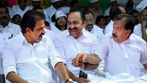 From left, Congress MP KC Venugopal, LoP in the Kerala Assembly and party leader VD Satheesan and party leader Ramesh Chennithala during a protest against the Centre's alleged dilution of the MGNREGA, in front of Kerala Lok Bhavan, in Thiruvananthapuram, Tuesday, Jan. 13, 2026.