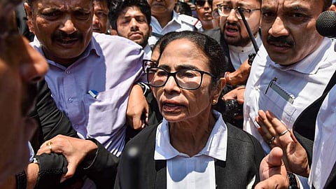 Former West Bengal chief minister and TMC supremo Mamata Banerjee leaves after appearing before the Calcutta High Court to argue a case in connection with alleged post-poll violence and attacks on party offices, in Kolkata, Thursday, May 14, 2026.