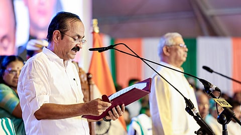 VD Satheesan takes oath as Kerala Chief Minister before Governor Rajendra Arlekar during the swearing-in ceremony of the new Council of Ministers of Kerala, in Thiruvananthapuram, Monday, May 18, 2026.