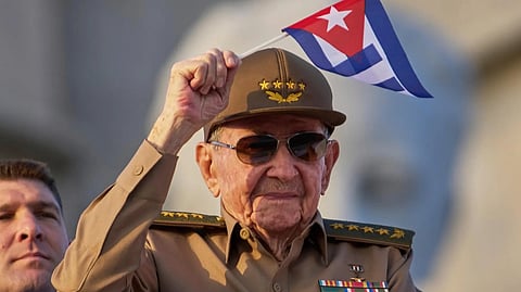Raul Castro waves Cuban national flag during a May Day parade at Revolution Square in Havana on May 1, 2025.