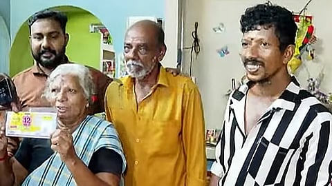 Kerala lottery Vishu bumper prize 12 crores winner Ponnan with family members.