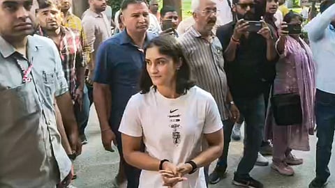 Wrestler Vinesh Phogat arrives at the venue of the National Open Ranking Wrestling Tournament amid a row over her eligibility and the Wrestling Federation of India's show-cause notice, in Gonda, Uttar Pradesh, Monday, May 11, 2026.