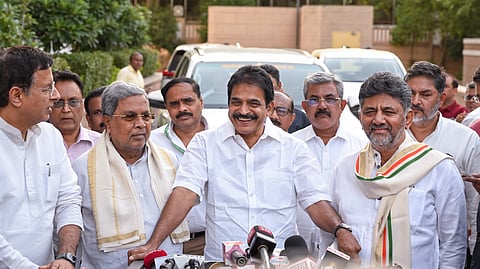 Karnataka Chief Minister Siddaramaiah, Deputy CM DK Shivakumar, and Congress MP KC Venugopal speak to the media after a meeting of the Congress high command at Indira Bhawan, in New Delhi, Tuesday, May 26, 2026.