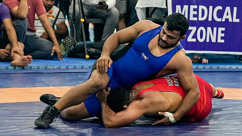Wrestlers Deepak Punia, in blue, and Sahil Jaglan compete during the men�s freestyle 97kg trials for the Asian Games, at the Sports Authority of India (SAI) Regional Centre, in Lucknow, Uttar Pradesh, Sunday, May 30, 2026.