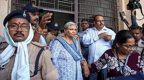 Former judge Giribala Singh, the prime accused in connection with Twisha Sharma death case, being escorted out of the court premises after being remanded to 14 days judicial custody, in Bhopal, Madhya Pradesh, Tuesday, June 2, 2026