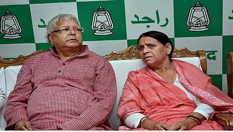 Bihar govt withdraws Z-plus security cover of Lalu, Rabri 	