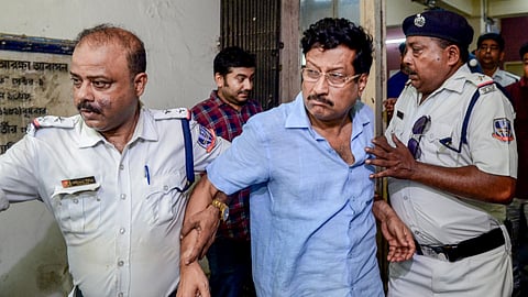 TMC leader and former Bidhannagar Municipal Corporation (BMC) chairman Sabyasachi Dutta being produced at court after his arrest from North 24 Parganas district on charges of extortion and criminal intimidation, in Kolkata, West Bengal, Tuesday, June 9, 2026.