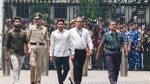 TMC leader Abhishek Banerjee reaches the CID headquarters for a second round of questioning in connection with the alleged forgery of the signatures of MLAs for the appointment of the leader of opposition in the West Bengal Assembly, in Kolkata, Sunday, June 14, 2026.