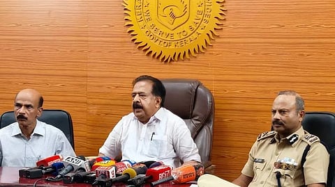 Home Minister Ramesh Chennithala speaks at a press conference held at the Fire Force headquarters. Police Advisor A. Hemachandran and Fire Force Chief Nitin Agarwal are nearby.
