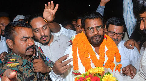 Jharkhand Mukti Morcha (JMM) candidate Baidyanath Ram shows a victory sign after he wins the state Rajya Sabha elections, at the state Assembly, in Ranchi, Thursday, June 18, 2026.
