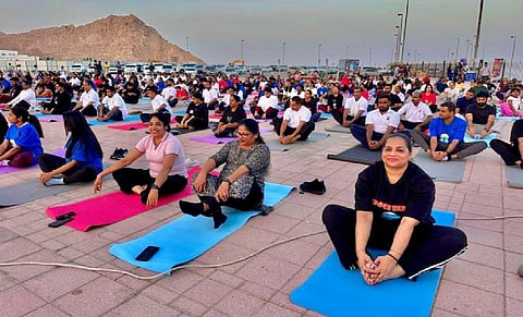 Thousands join International Yoga Day events worldwide