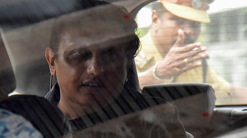 P.A Mohammed Riyas, son-in-law of former Kerala CM Pinarayi Vijayan, waits in his car, as his wife Veena T, appears before ED, for questioning in connection with a money laundering case involving her now-defunct IT firm and mining company CMRL, in Kochi, Wednesday, June 17, 2026.