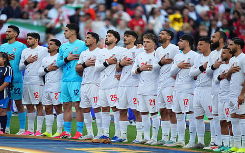 Iran narrowly knocked out of tumultuous World Cup on Austria''''s last-second goal