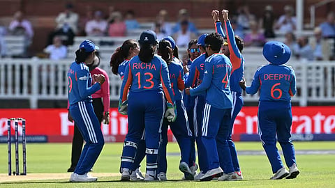 The Indian players celebrate Renuka Singh's dismissal of Australian opener Georgia Voll in their ICC Women's T20 World Cup Group 1 clash at Lord's. 