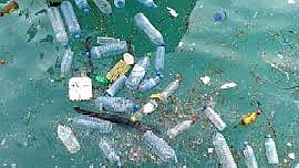 Plastic waste deposit in river water