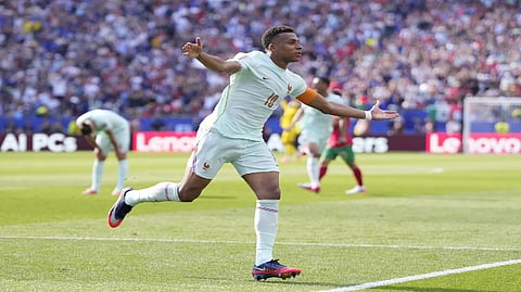 Kylian Mbappe has a goal and an assist as France beats Morocco 2-0 in World Cup quarterfinals