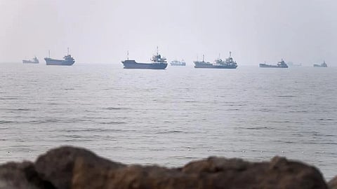 Commercial vessels are seen in the Strait of Hormuz off Bandar Abbas, Iran.