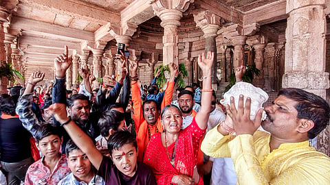 People offer prayers at the Bhojshala complex following the Madhya Pradesh High Court verdict declaring the site a Hindu temple dedicated to Goddess Vagdevi (Saraswati), in Dhar, Friday, May 22, 2026.