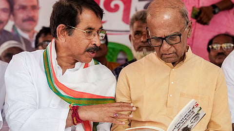 West Bengal Pradesh Congress Committee (WBPCC) President Subhankar Sarkar, left, and senior party leader Pradip Bhattacharya stage a dharna with others in protest against the BJP's alleged false propaganda over 'Paschimbanga Divas', at Bidhan Bhawan, in Kolkata, Saturday, June 20, 2026.