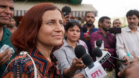 Gitanjali J Angmo, wife of educator and climate activist Sonam Wangchuk, speaks to the media outside the Safdarjung Hospital, in New Delhi, Sunday, July 19, 2026.
