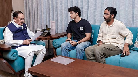 Union Minister JP Nadda, left, meets Cockroach Janta Party (CJP) spokespersons Saurav Das and Ashutosh Ranka amid an ongoing protest by CJP over the alleged NEET paper leak, in New Delhi.