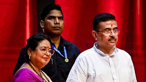 West Bengal Chief Minister Suvendu Adhikari launches the 'Annapurna Yojana' distribution programme for the empowerment and socio-economic upliftment of women, as cabinet Minister Malati Rava Roy looks on, in Kolkata, West Bengal, Wednesday, July 1, 2026.