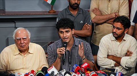 Rajya Sabha MP Kapil Sibal, CJP spokespersons Saurav Das and Ashutosh Ranka during a press conference on the aftermath of the student protests over the NEET paper leak, in New Delhi, Monday, July 27, 2026.