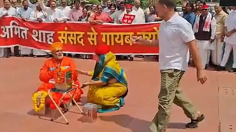 Saffron-clad Pappu Yadav enacts 'chanda chori' at Oppn protest in Parliament complex