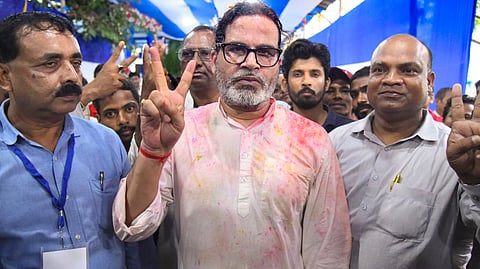 Jan Suraaj Party chief Prashant Kishor celebrates with supporters after taking the lead in the Bankipur Assembly by-election during the counting of votes, in Patna, Monday, Aug. 3, 2026.