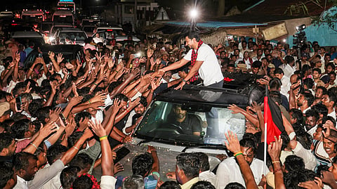 Tamil Nadu Leader of the Opposition Udhayanidhi Stalin being greeted by supporters after being questioned at the Sengipatti police station, in Thanjavur district, Tamil Nadu, Tuesday, Aug. 4, 2026.