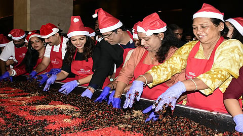 Popular actress Nikhila Vimal and Dinesh Rai, General Manager, Crowne Plaza Kochi during the festive cake mixing ceremony at Crowne Plaza Kochi.