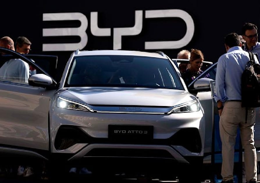China's BYD launches EV charging system it says works nearly as fast as ...