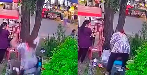 Graban momento en que una coladera se "come" a señora [VIDEO]