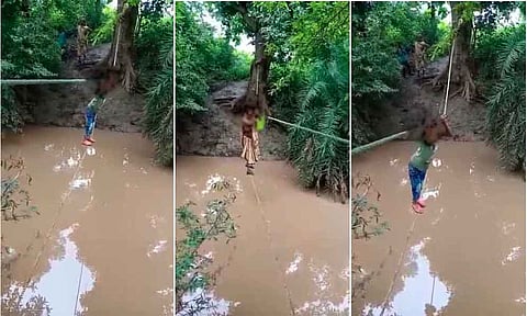 रस्सी के सहारे नदी को पार करता बच्चा और महिला [फोटो- वायरल वीडिओ क्लिप से]