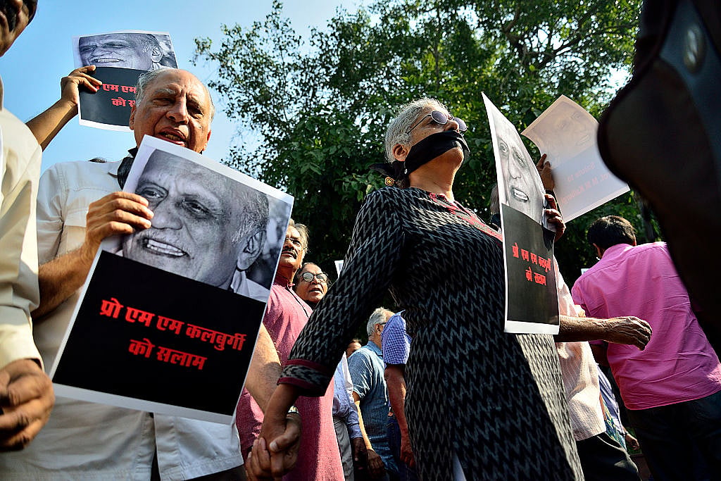 Writers and cultural activists  protest  the killing of writer MM Kalburgi and others  in New Delhi; <i>Photo by Priyanka Parashar/Mint via Getty Images</i>