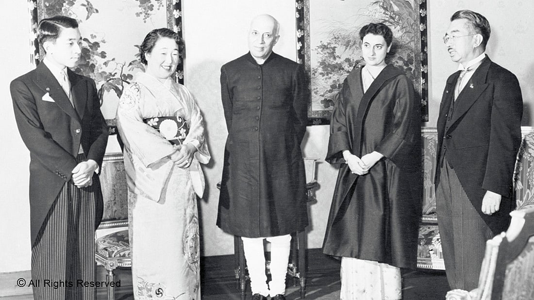 ROYALTY—Prime Minister Jawaharlal Nehru (centre) at the Imperial Palace in Tokyo with his host, Emperor Hirohito (right) in 1957. Also seen are (from left) Crown Prince Akhihito, Empress Nagasako and Indira Gandhi.