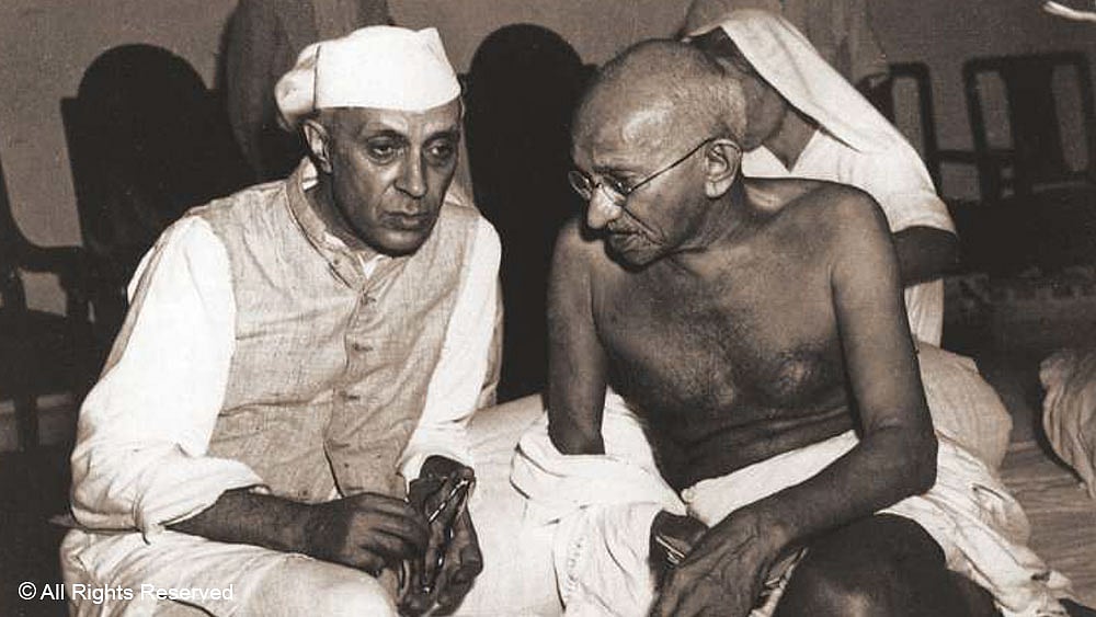 Mahatma Gandhi in conversation with Jawaharlal Nehru at the All India Congress Committee meeting in Bombay, 1946