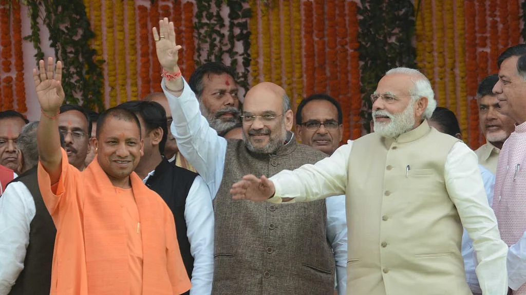 
















File photo of UP CM Yogi Adityanath and Prime
Minister Narendra Modi with BJP President Amit Shah (centre) during the
swearing-in ceremony on March 19 in Lucknow