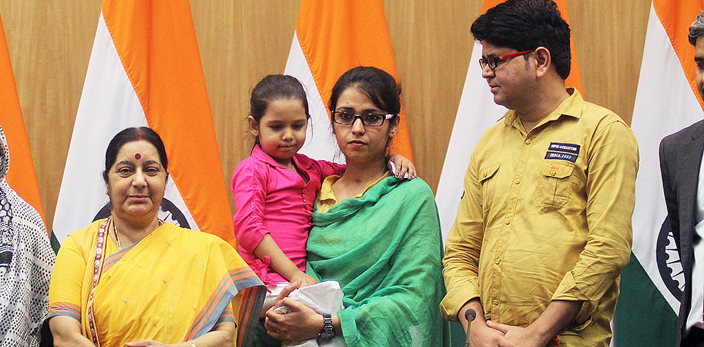 Indian woman forced to marry at gunpoint in Pak returns home
