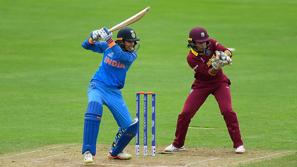 Centurion Mandhana guides India to a thumping
victory 