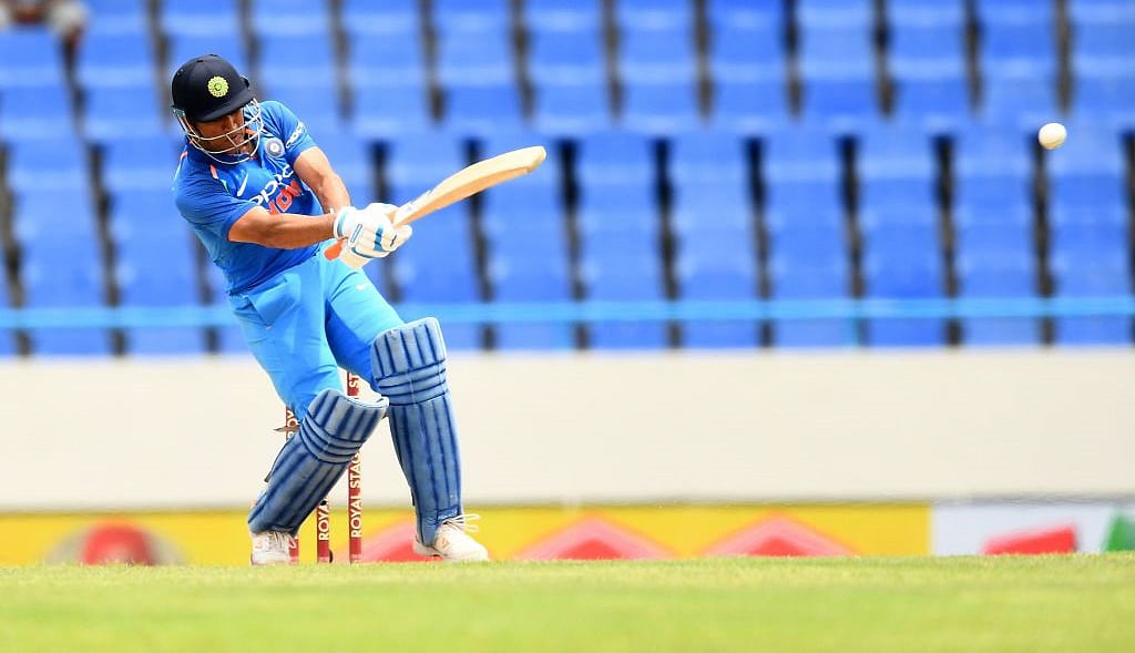 Dhoni, Jadhav star in a comfortable win for India