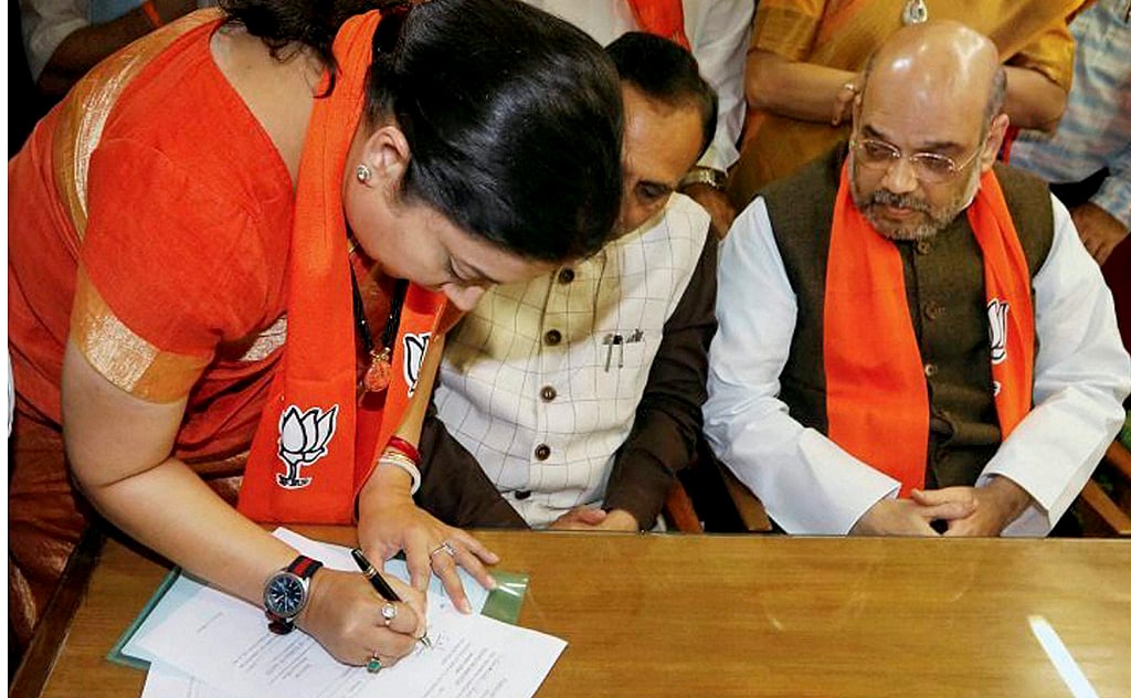 Amit Shah, Irani file affidavits in Gujarati and English